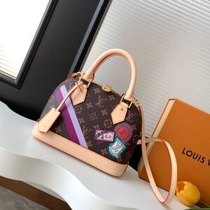 Louis Vuitton Mini Bag in Brown and Tan with Purple Accent